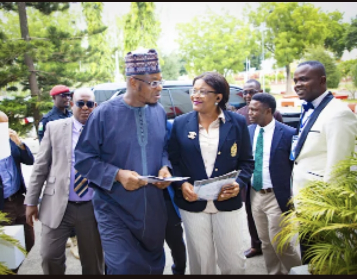 Madam Chiaka, Mr. Onifade, Sylvanus and Martins welcoming the Honourable Minister