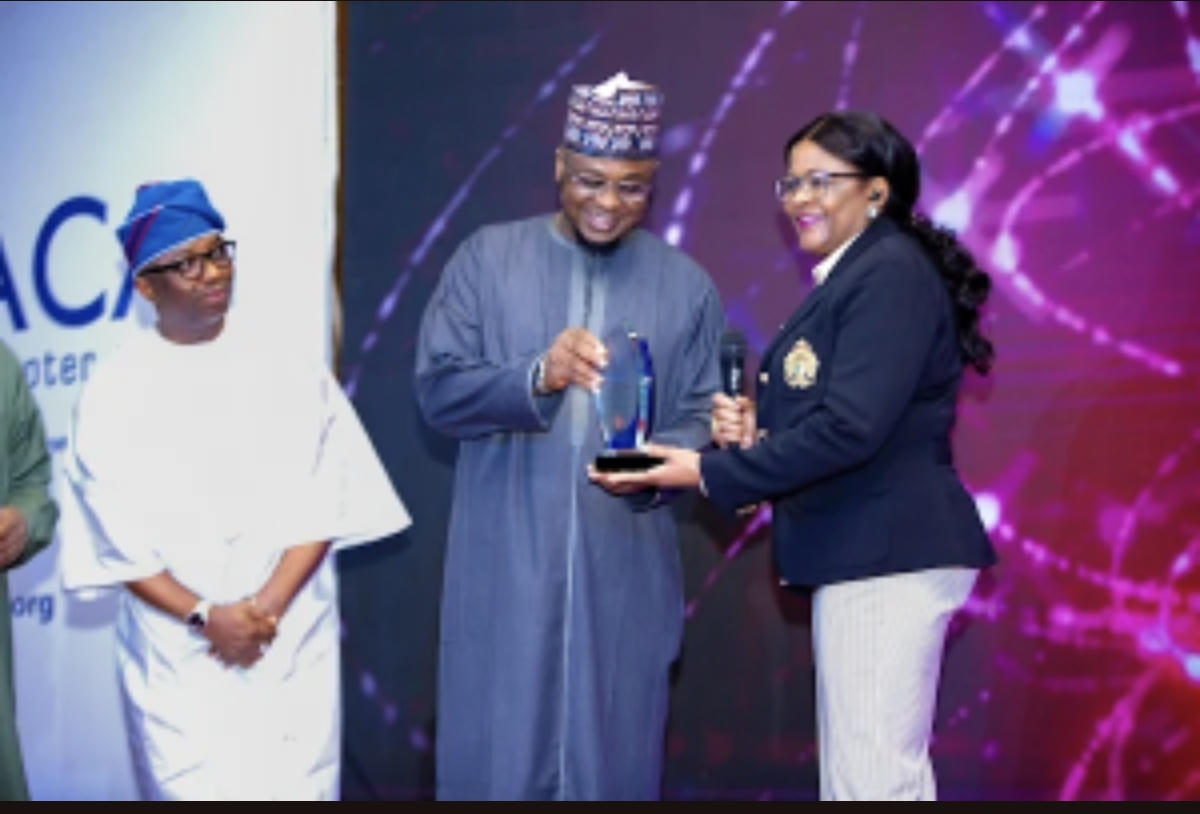Mrs Chiaka Ben-Obi with Dr Vincent Olatunji, National Commissioner NDPC